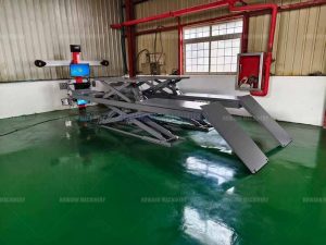In-ground scissor lift for auto workshop space saving