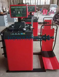 Automotive tire dynamic balancing machine